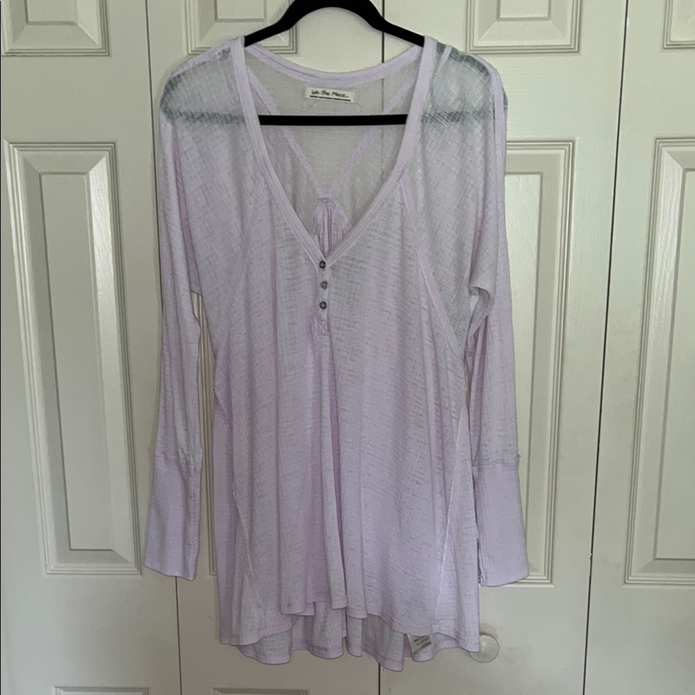 WE THE FREE
Lavender knit top size m, runs large
